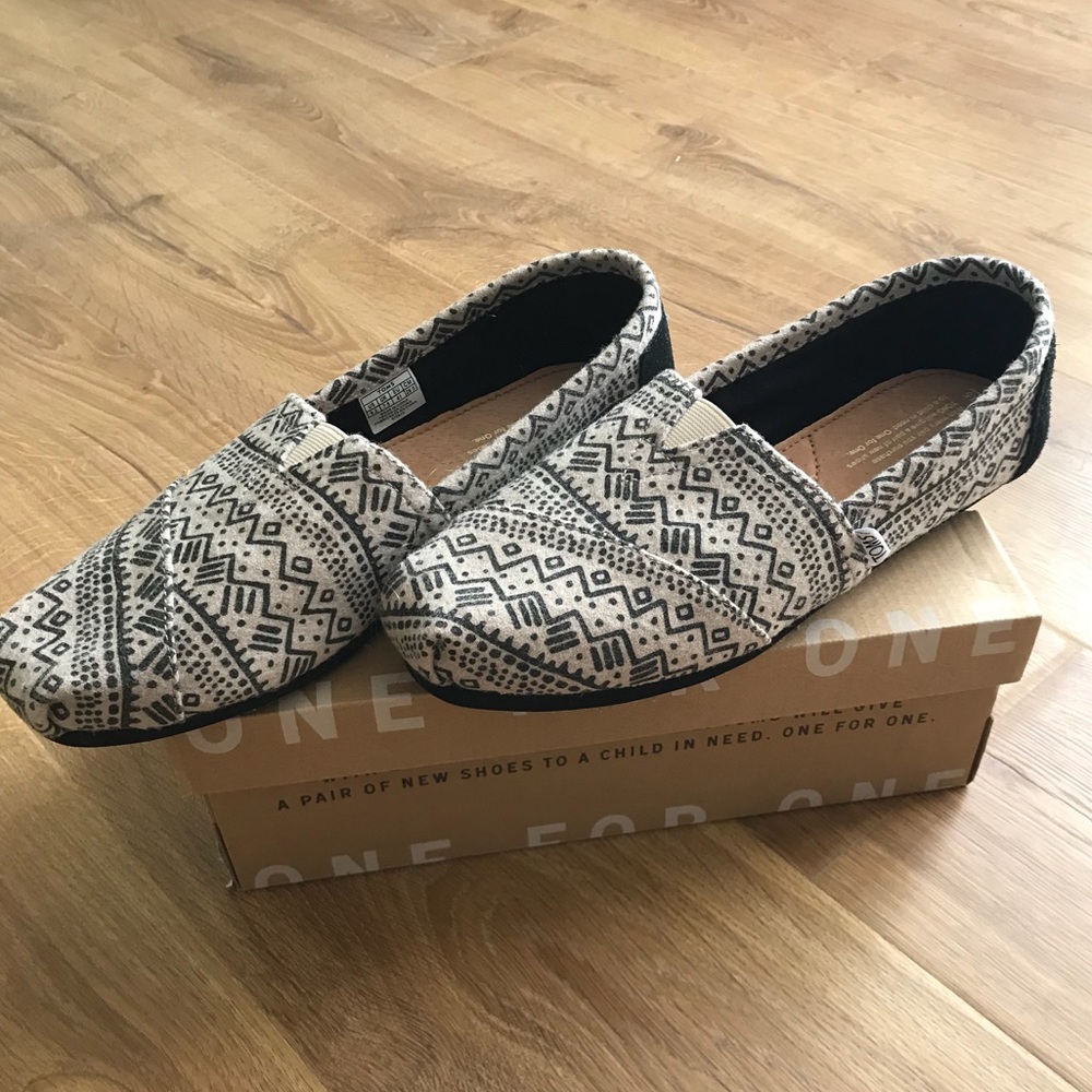 Brand new still in the box TOMS!!